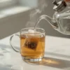 Step by step Heen Bovitiya herbal tea brewing process glass mug hot water steeping instructions